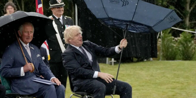 Prince Charles keeps His Cool When Boris Johnson Has Funny Umbrella Situation