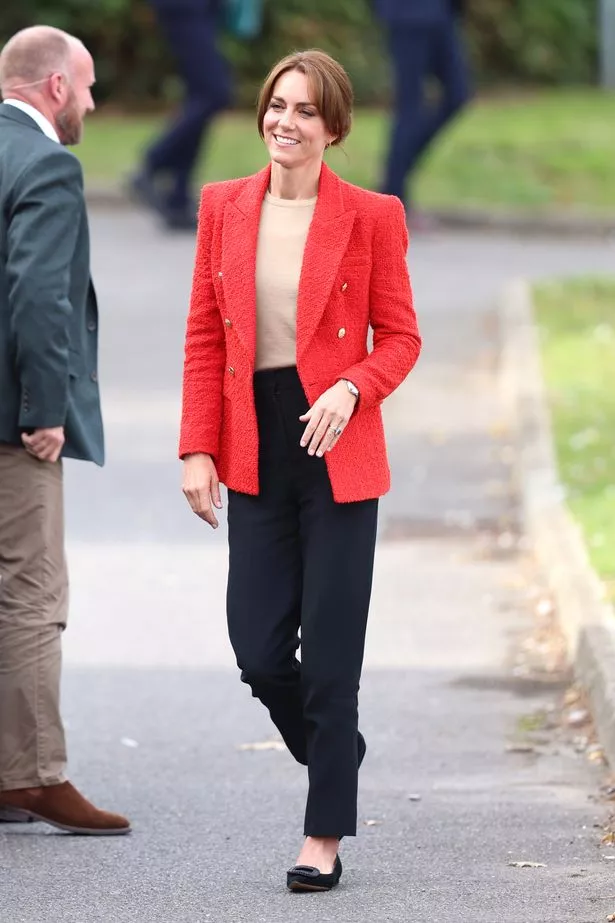 Kate Middleton was all smiles as she arrived at her latest solo engagement looking stylish in velvet pumps