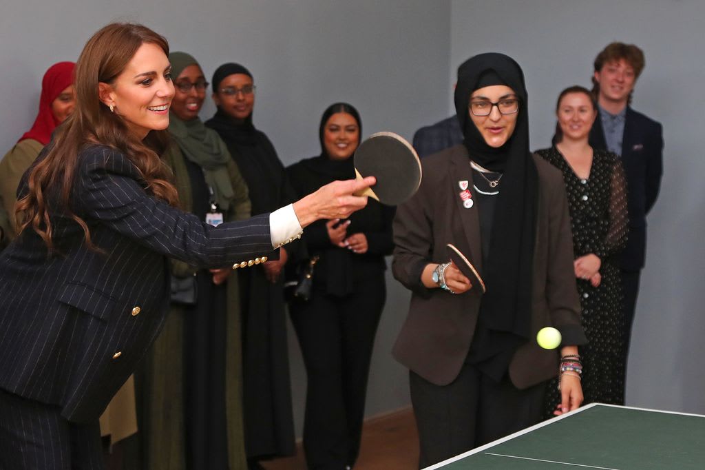 The Princess of Wales plays table tennis during a visit to the Grange Pavilion