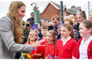 Princess Kate smiling after a group of schoolchildren respond “no” to being back at school, during her Sudbury Silk Mills visit