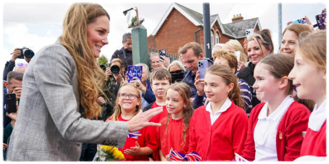 Princess Kate smiling after a group of schoolchildren respond “no” to being back at school, during her Sudbury Silk Mills visit