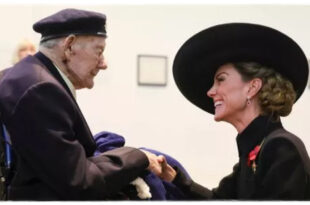 Princess Kate smiling warmly while speaking with a 100-year-old veteran who shared his secret to a long life