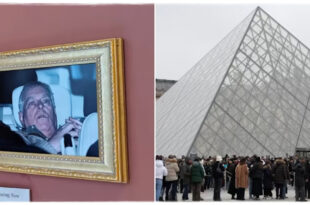 Photograph of Prince Andrew displayed on a wall inside the Louvre Museum