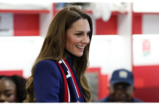 Princess Kate wearing an Alexander McQueen coat during a confident public appearance