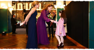 Four-year-old Sahrae-Lea Herbert performing a curtsy in front of Prince William and Princess Kate at the Digger premiere